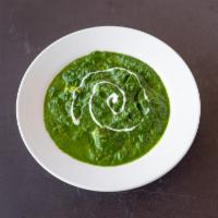 Saag  Paneer · Spinach and fried paneer chunks cooked in a tomato based sauce.