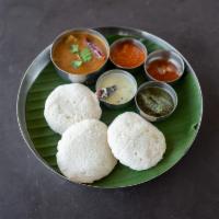 2 Piece Sambar Idli · Rice cake in lentil stew. Steamed South Indian rice cakes made from fermented rice and black...