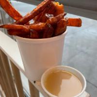 Sweet Potato Fries · With maple dipping sauce
