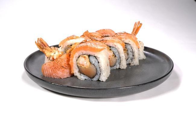 Shachihoko Tempura Roll · Shrimp Tempura and Salmon covered in seared Salmon and topped with Tempura Flakes