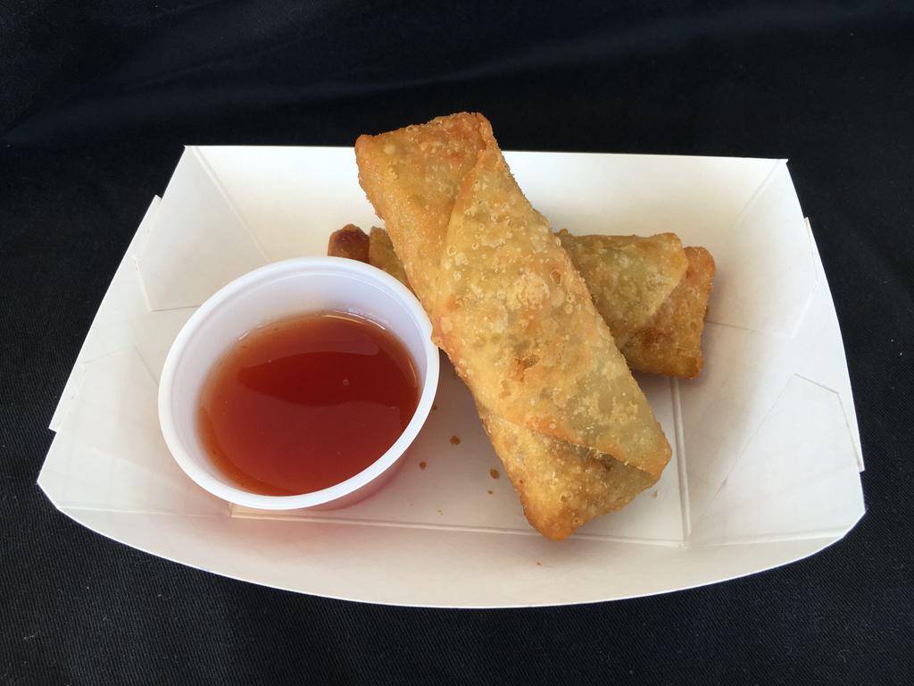 Lydia's Egg Roll · Home made egg roll with pork, bean thread noodle and vegetable stuffing.