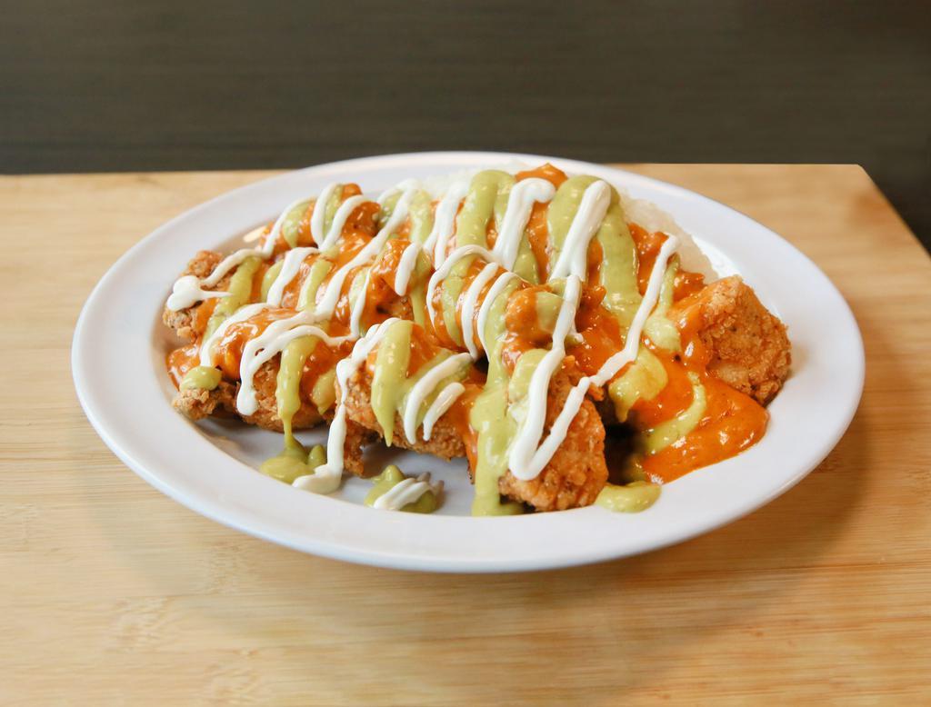 The Marcocito · Tex-Mex. Crispy chicken (breaded chicken breast) or grilled chicken topped with homemade queso with salsa verde and sour cream drizzle, served over jasmine rice.