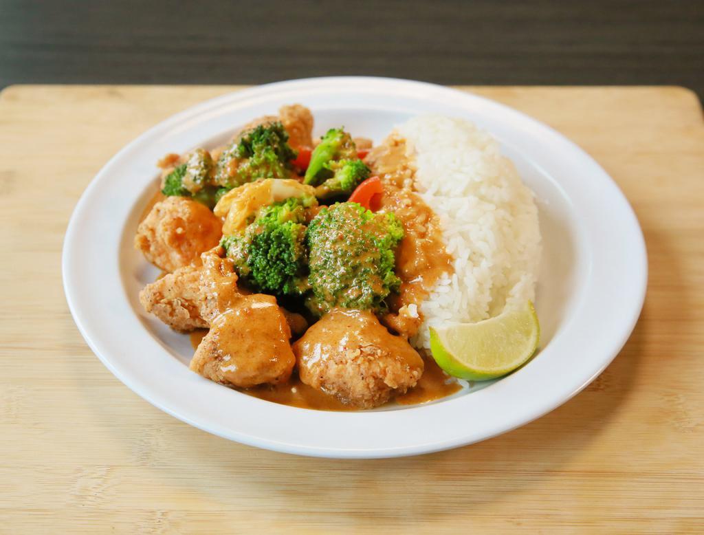 Kuala Curry · Thai/Malaysian. Crispy chicken (breaded chicken breast) or grilled chicken with mixed veggies and covered with medium spicy curry sauce, served over jasmine rice.