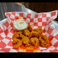 Buffalo Shrimp · Fried crispy and tossed in your choice of sauce.