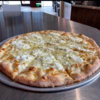 New York White Pizza · Mozzarella, ricotta, fresh garlic and extra virgin olive oil.