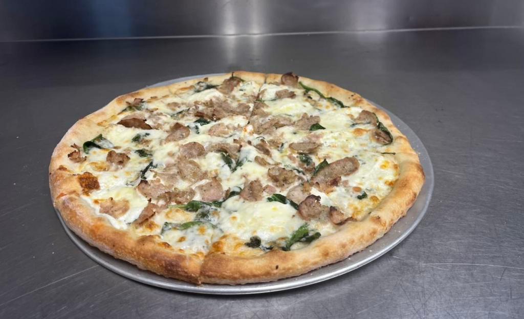 Brooklyn White Pizza · Mozzarella, ricotta, fresh spinach, sausage, garlic and extra virgin olive oil.
