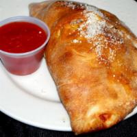Create Your Own Stromboli · Includes mozzarella and up to 3 toppings. Served with marinara on the side.