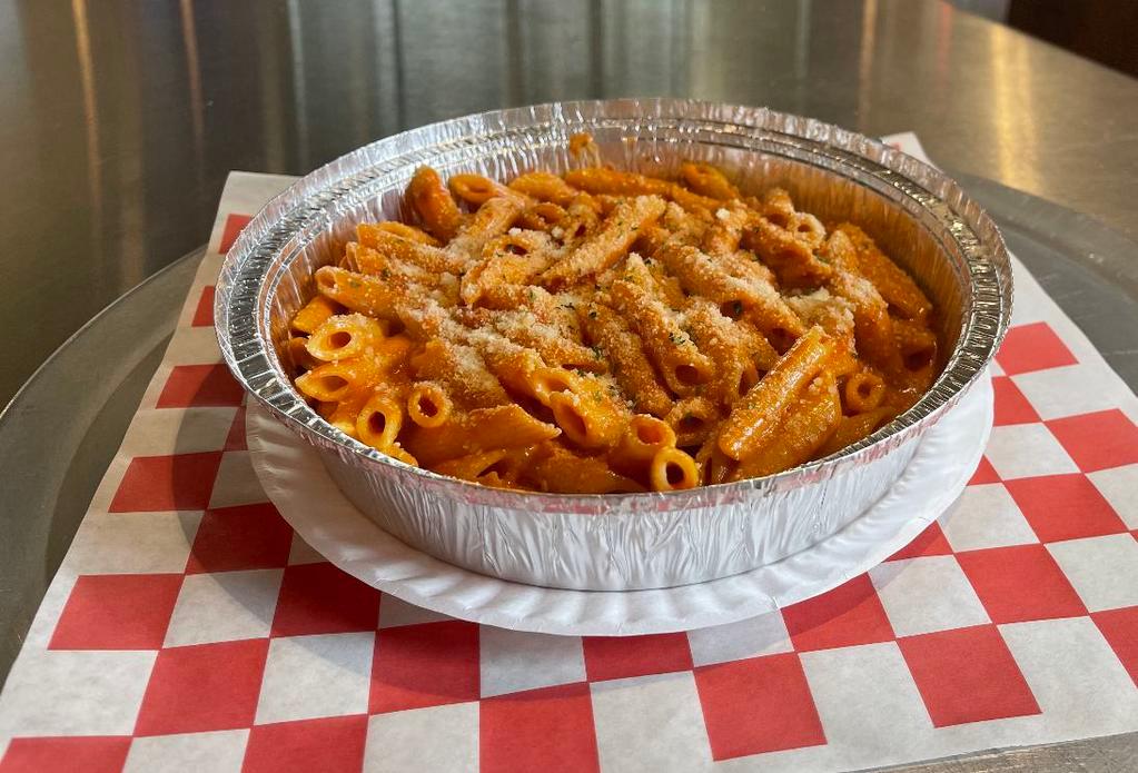 Penne alla Vodka · Penne pasta tossed in made-to-order marinara-cream sauce. Served with garlic bread.