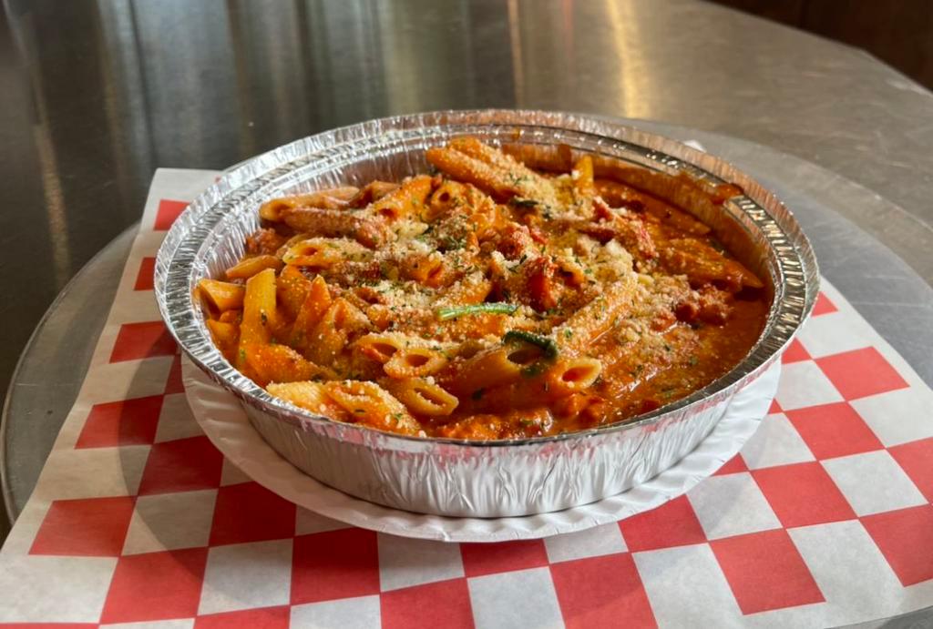 Penne Alla Casa · Penne pasta tossed with made-to-order marinara-cream sauce, with sauteed spinach, mushroom and sun-dried tomato. Served with garlic bread.