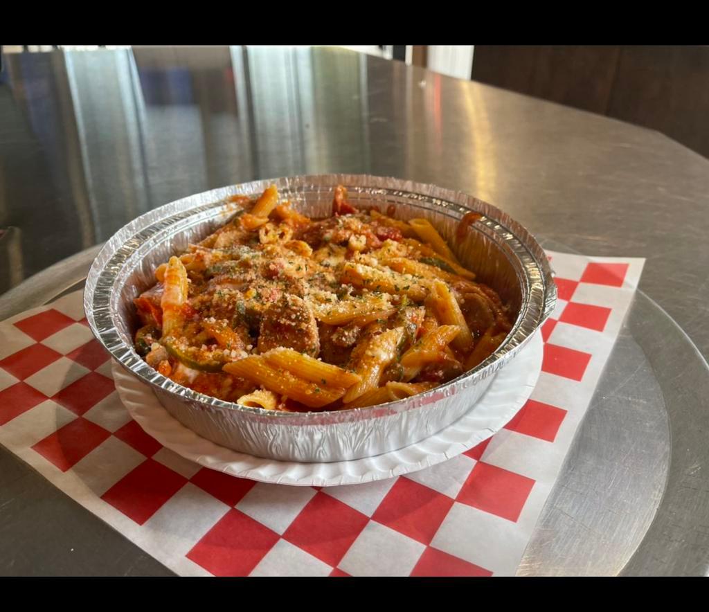 Sausage Penne Pasta · Italian sausage, green pepper, red pepper, onion, homemade marinara and mozzarella cheese. Served with garlic bread.