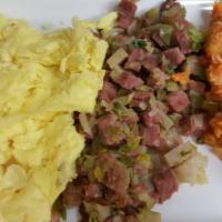 Corned Beef Hash and Eggs Breakfast · Eggs your way with house made corned beef hash and leeks served with sweet potato tots. May ...