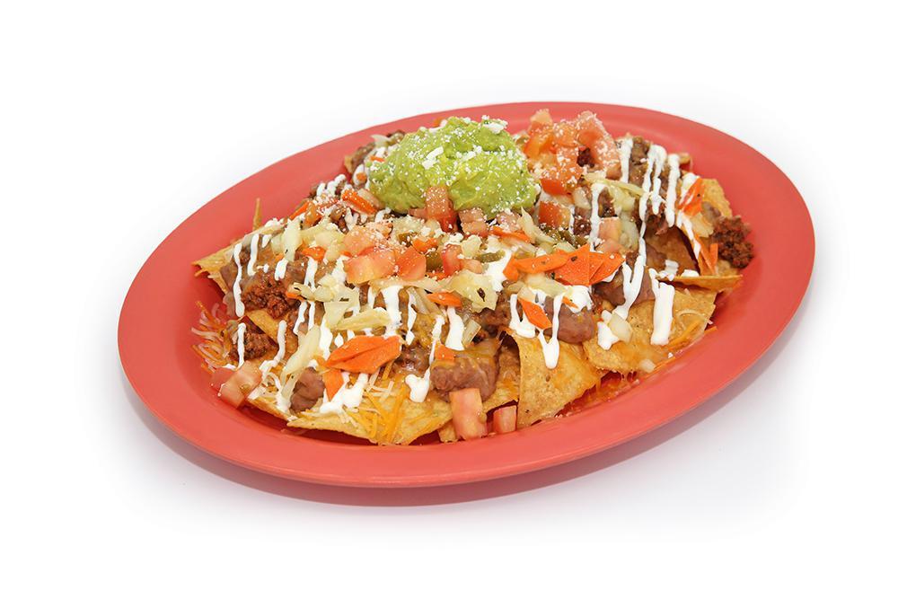 Big Pe‘ahi Nachos Plate · Choice of chicken adobo, shredded chicken, ground beef, kalua pork, al pastor pork or steak. Beans, cheese, tomatoes, pickled veggies, sour cream, guacamole and Cotija cheese.