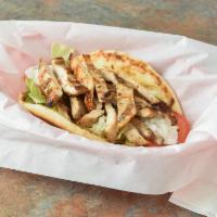 Grilled Chicken Pita Dinner · Served with fries and Greek salad.