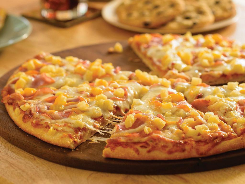 Hawaiian Pizza (Baking Required) · Canadian Bacon and Pineapple, Whole-Milk Mozzarella and Mild Cheddar,
topped with Traditional Red Sauce on Our Original Crust.