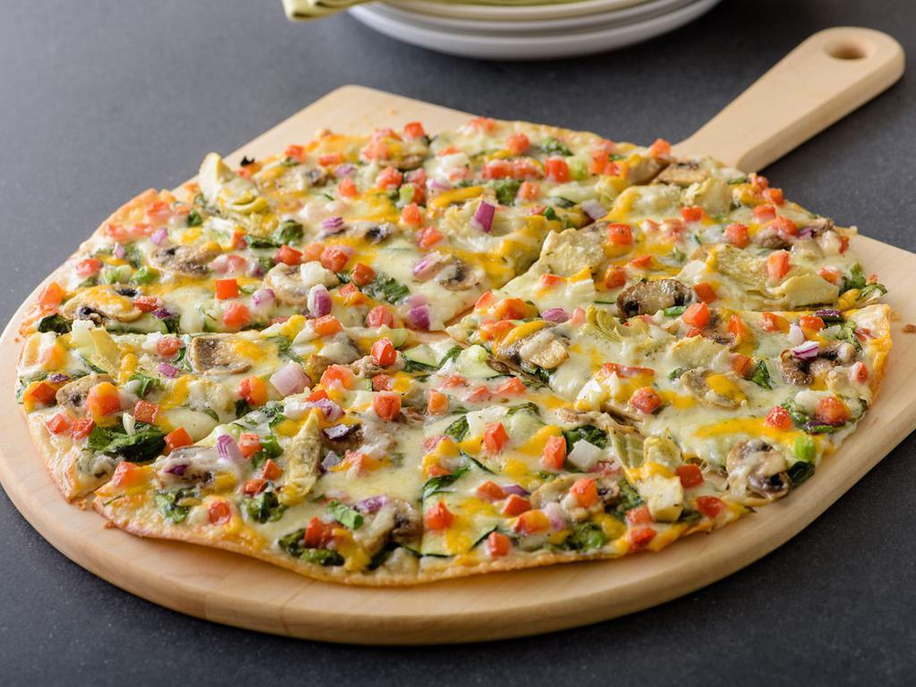 Gourmet Vegetarian Pizza (Baking Required) · Fresh Spinach, Sliced Zucchini, Sliced Mushrooms, Marinated Artichoke Hearts, Roma Tomatoes, Mixed Onions, Whole-Milk Mozzarella, Mild Cheddar and Herb & Cheese Blend, topped with Creamy Garlic Sauce on Our Artisan Thin Crust.