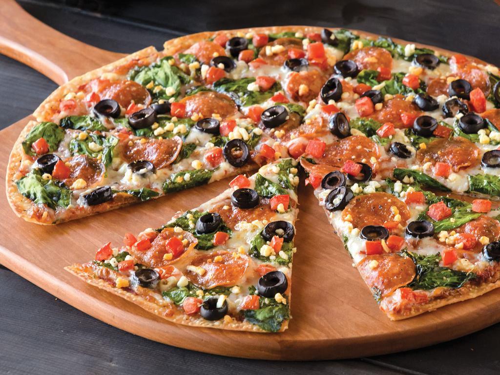 Greek Pepperoni Pizza (Baking Required) · Pepperoni, Spinach, Black Olives, Tomatoes, Feta Cheese, Zesty Herbs, Red Sauce, Artisan Thin Crust