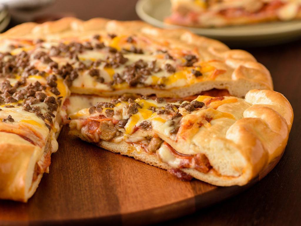 5-Meat Stuffed Pizza (Baking Required) · Two layers of Original Crust Stuffed with Canadian Bacon, Pepperoni, Italian Sausage, Bacon, Red Sauce, topped with Ground Beef, Cheddar, Red Sauce