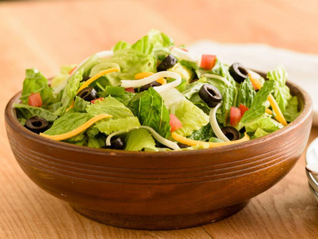 Garden Salad · Romaine Lettuce topped with Green Peppers, Roma Tomatoes, Black Olives, Whole-Milk Mozzarella and Mild Cheddar Cheeses.