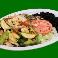 Veggie Plate · Grilled vegetables served with rice, beans, lettuce, guacamole, sour cream and tortillas.