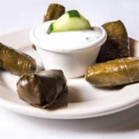 5 Piece Dolmatos · Grape leaves stuffed with rice. Served with tzatziki sauce.