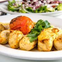 Chicken kabob · A skewer of boneless chicken breast chunks marinated in saffron sauce and char-broiled. Serv...