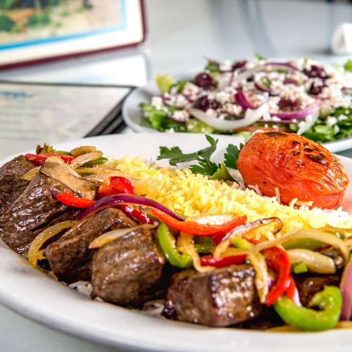 Shish Kabob (Ribeye meat) · 6 pieces marinated and char broiled beef tenderloins, onions, tomatoes red and green peppers and mushrooms. Served with basmati rice, pita bread and salad.