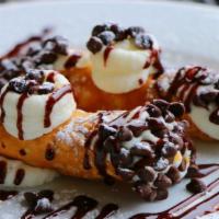 Large Cannolis · 2 Crisp pastry shells filled with sweetened imported cheese dipped in chocolate chips and du...