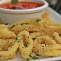 Fried Calamari · Rings of calamari and sliced peppers hand battered with a hint of lemon pepper fried to cris...