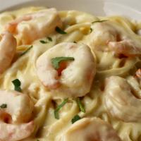 Shrimp Alfredo · Fresh shrimp pan sauteed and simmered in creamy alfredo served over pasta