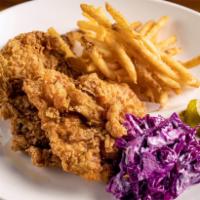 Buttermilk Fried Chicken Thigh · Buttermilk marinated chicken thigh fried to perfection, homemade pickles, coleslaw & a side ...