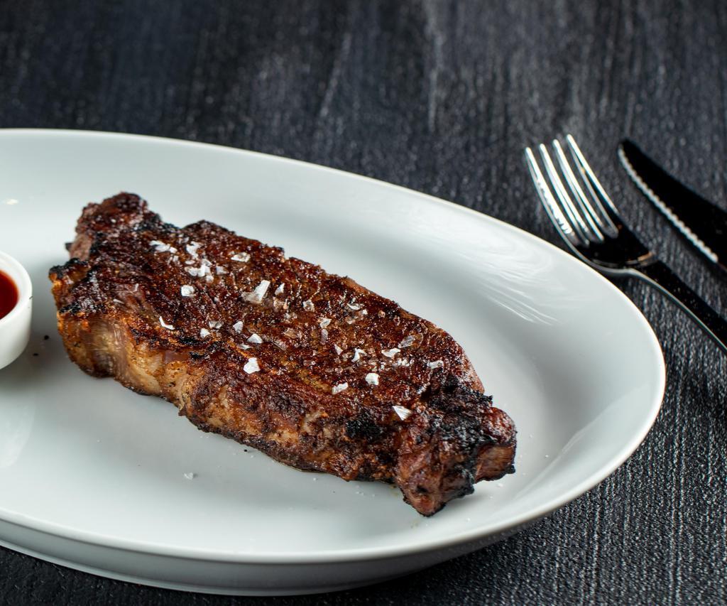 NY Strip 14 oz · 14 oz New York strip steak cooked to the desired temperature & choice of STK sauce.
