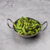 Edamame · Boiled fresh garden soybean, seasoned with sea salt. Add spicy garlic for an additional char...
