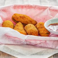 Jalapeno Poppers · Cream cheese filling.