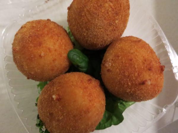 Arancini · 4 cheese rice balls served with marinara sauce.