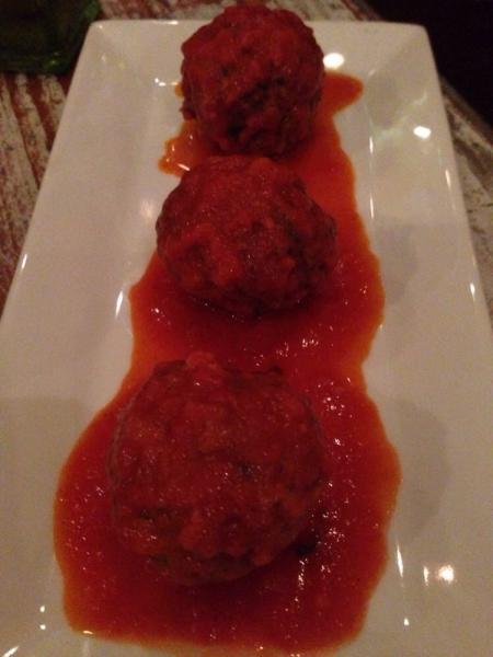Polpettine · Beef meatballs slowly cooked in tomato sauce and shaved Parmigiano.
