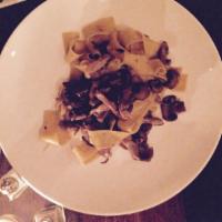 Pappardelle Tartufo and Speck · Homemade pappardelle, mushrooms, and truffle pate, speck.