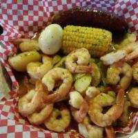 4. Small Shrimp Platter · 10 shrimp, corn, egg, sausage and potatoes.