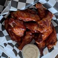 Wings · Meaty wings baked and then fried to perfection, tossed in your favorite sauce.  