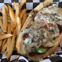 Philly · Steak, grilled onions and red and green peppers and provolone. Served on toasted sub roll.  ...