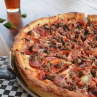 Hefty Pizza · Pepperoni, ham, Canadian bacon, Milton’s sausage, ground beef and mozzarella