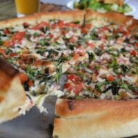 Margherita Pizza · Olive oil, garlic, fresh basil, tomato slices and fresh mozzarella.