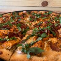 Black-N-Bleu · Thin Crust, Olive Oil and Garlic,  Blackened Chicken, Bacon, Bleu Cheese Crumbles,  Red Onio...