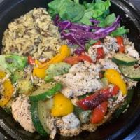 Mediterranean Chicken Power Bowl · Roasted Chicken sautéed with red and yellow peppers, zucchini and broccoli, served beside fr...