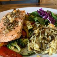 Mediterranean Salmon Power Bowl · Oven roasted Salmon with  sautéed with red and yellow peppers, zucchini and broccoli, served...