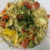 Pasta Primavera · Garden Fresh zucchini, red & yellow peppers, broccoli, tomatoes sautéed in a light olive oil...