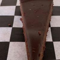Dark Chocolate Torte · Dense flourless dark chocolate torte, so smooth, yet intense chocolate experience. Gluten fr...