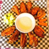 10 Wings (Half Order) · These babies are baked to juicy goodness. Served with a side of ranch dressing.