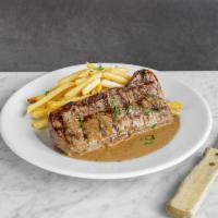 Steak au Poivre · Grilled Hanger Steak, Peppercorn sauce and Shoe String Potatoes