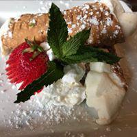 Fresh Cannoli · A mixture of homemade sweetened ricotta cheese mixture, piped to order into 2 crispy cannoli...