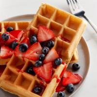 Malted Waffles · Buttermilk-malt waffles with whipped margarine and maple syrup. Add berries for an additiona...